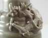 Greenware funerary jar and lid with dragon, bird, and a dog (oblique)